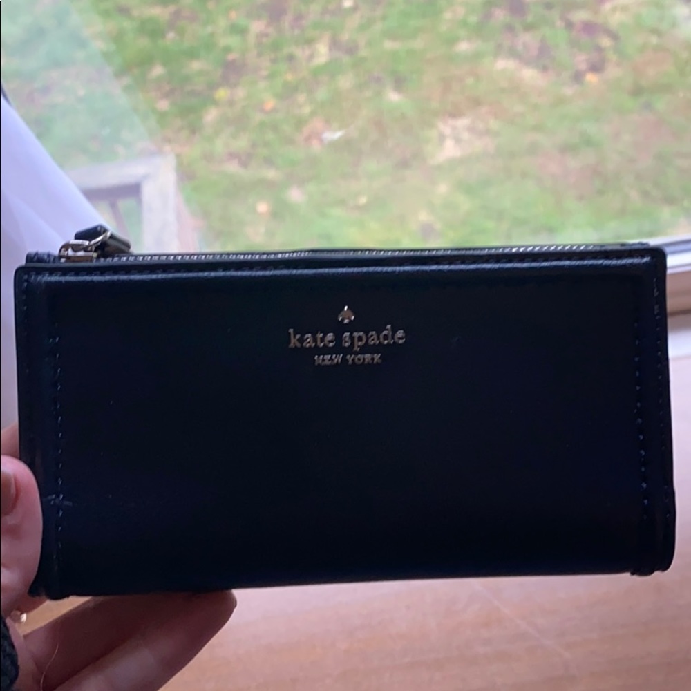 Kate spade wallet practically new